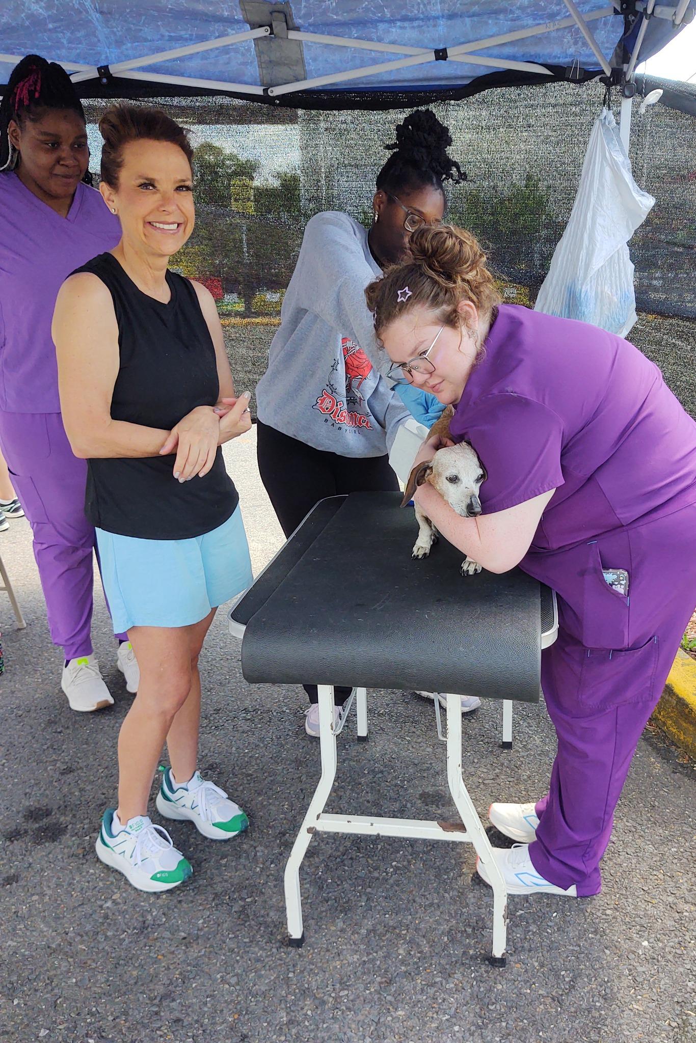 FAUNA volunteers and community members at a pet health fair